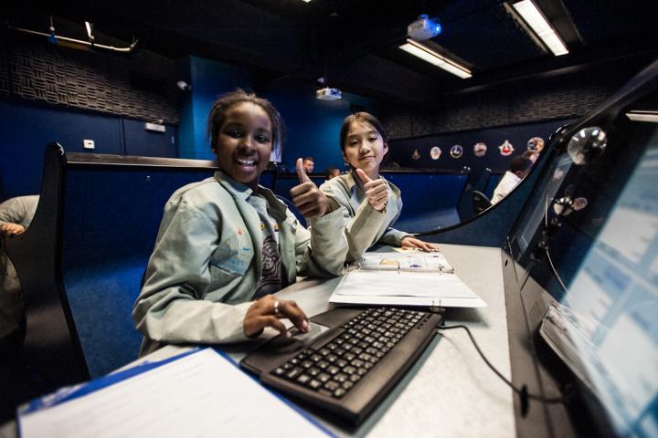 Young Learners Enjoying an Interactive Space Simulation at the UTC Challenger Center
