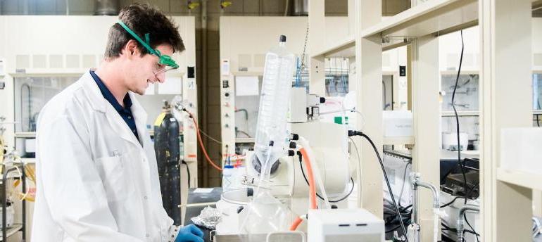 Chemistry student in lab with goggles